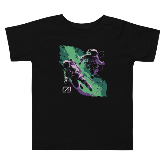 Nerd Alert's Spacemen toddler T-shirt design with two astronauts floating in front of a green and purple galaxy and the Nerd Alert logo.